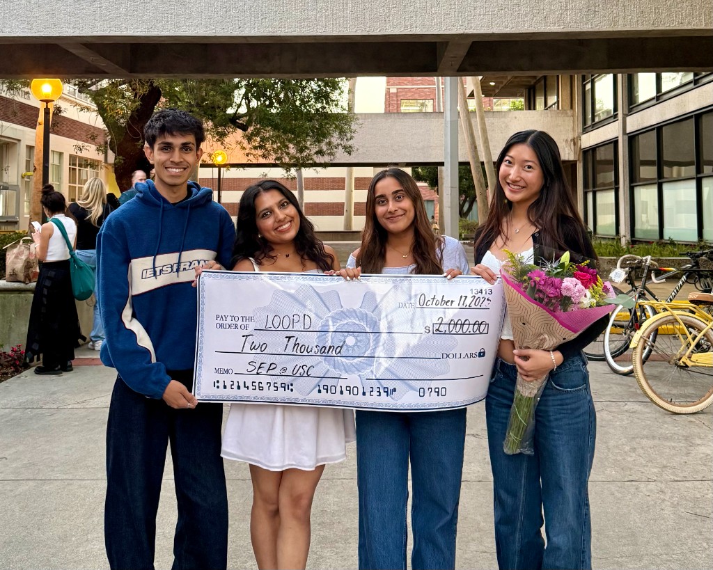 Launch check presentation with flowers